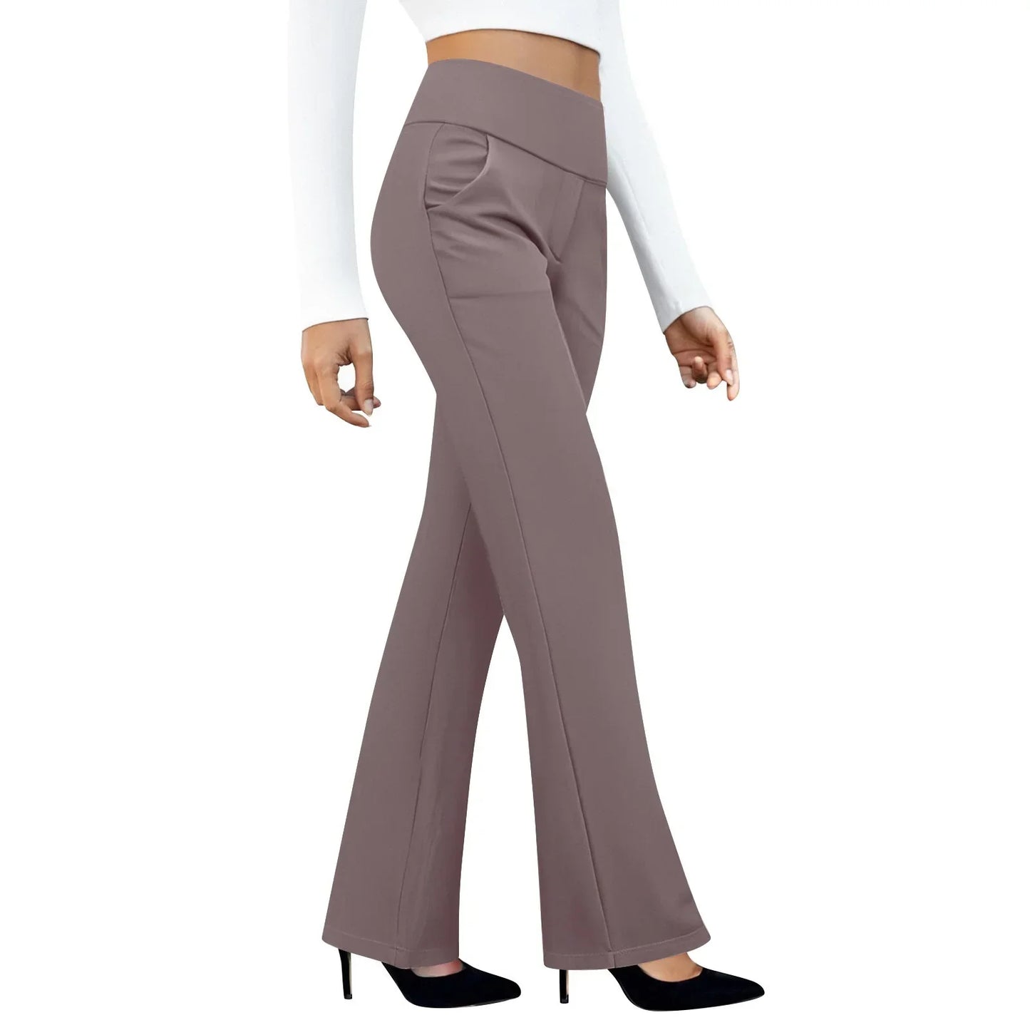Woman wearing high-waisted taupe flare pants with pockets and black heels on white background