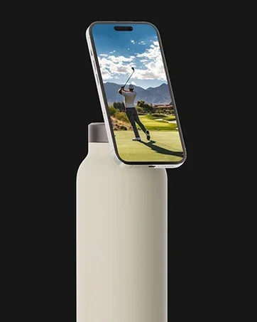 Smartphone mounted on top of a modern water bottle, black background