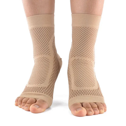 Beige open-toe compression ankle sleeves worn on feet for support and pain relief