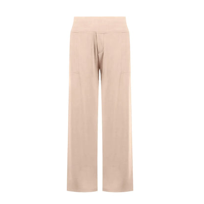 Beige wide-leg lounge pants with high waistband and patch pockets, modern minimalist style