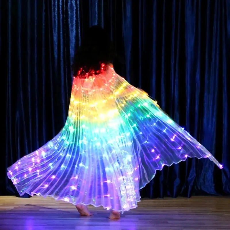 Woman dancing in illuminated rainbow LED wings with pleated fabric on a stage