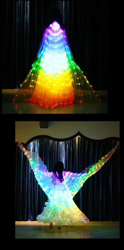 Person wearing illuminated LED light-up wings costume with rainbow colors on stage