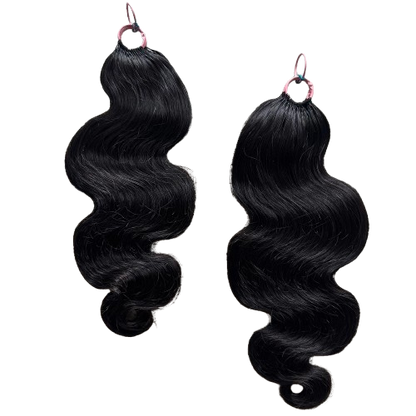 Pair of wavy black hair extensions with loose curls and natural shine