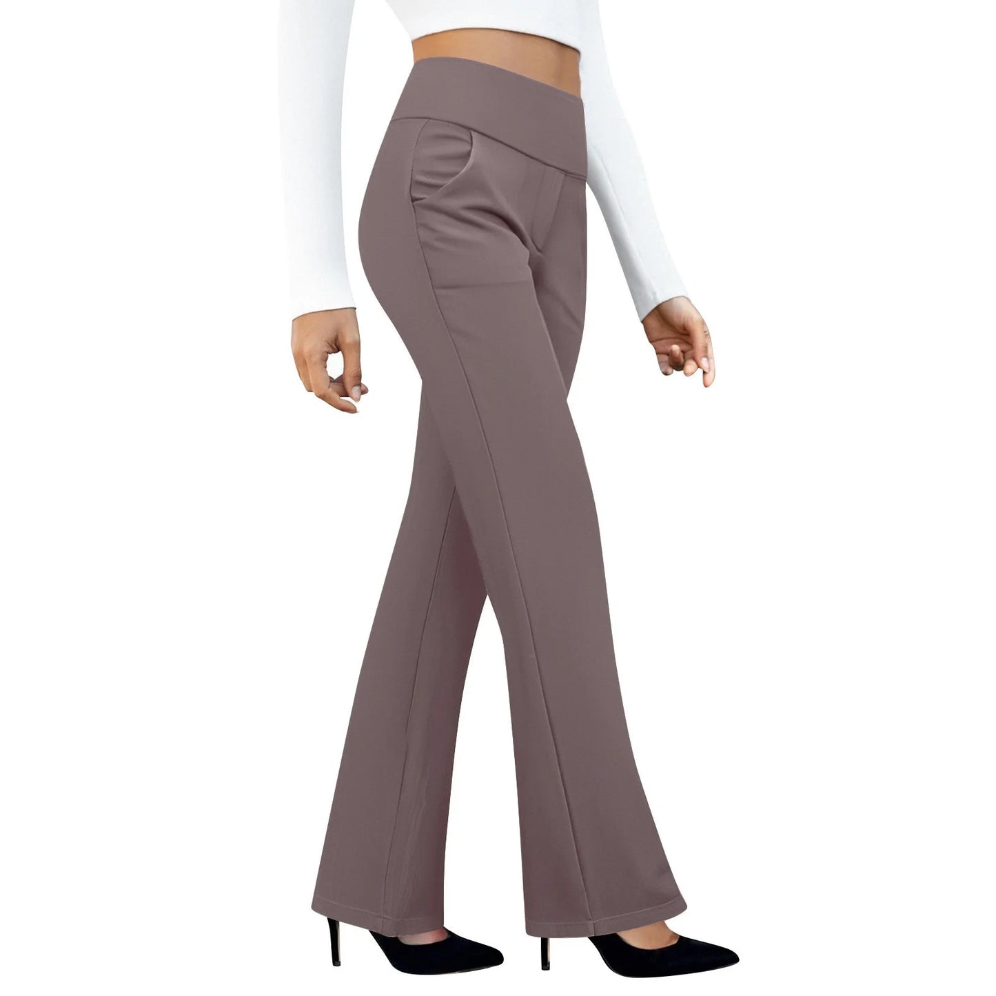 Woman wearing high-waisted taupe flared pants with pockets and black heels on white background