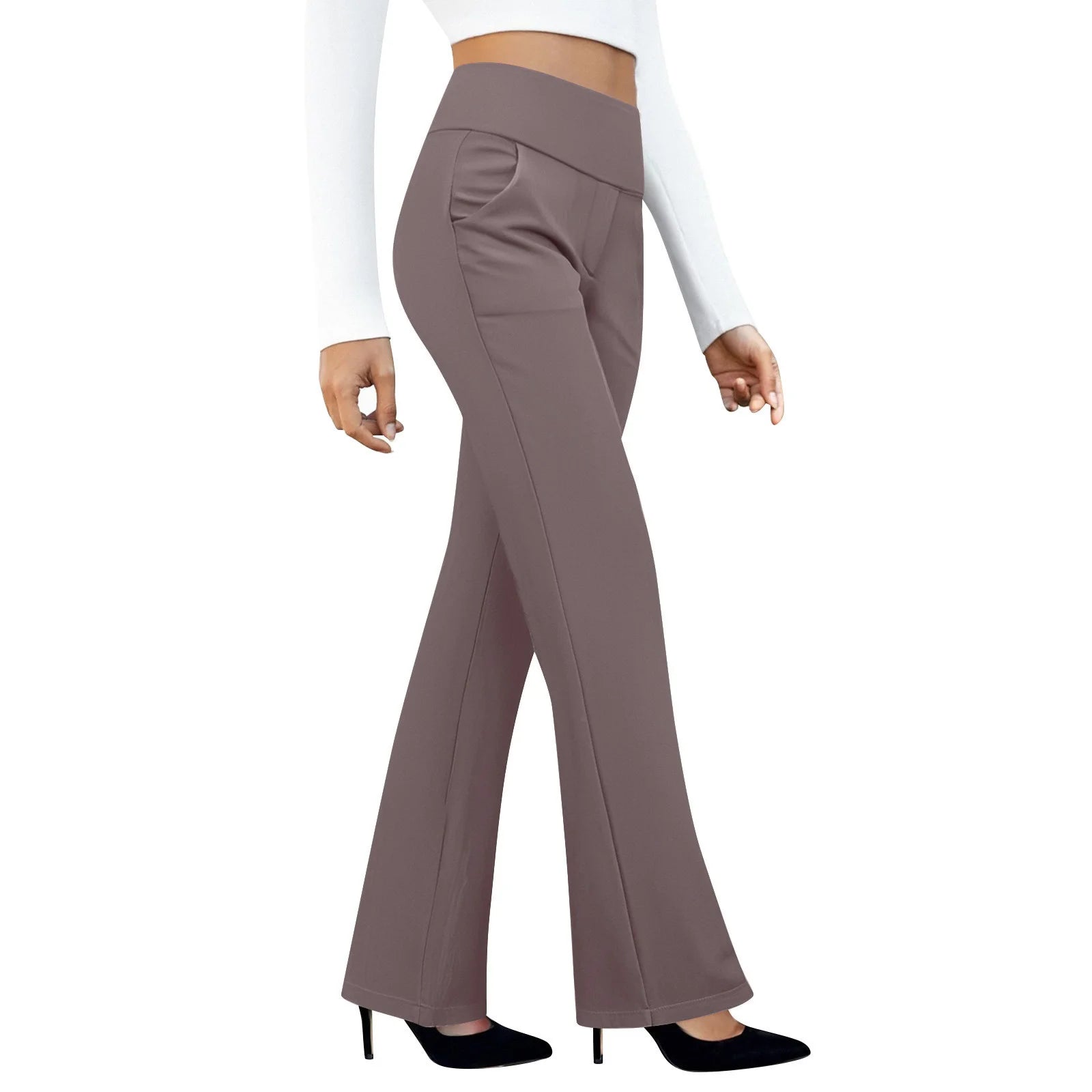 Woman wearing high-waisted taupe flared pants with pockets and black heels on white background