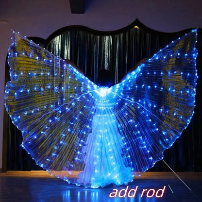 Person wearing illuminated LED light up wings costume indoors, glowing blue for dance or party.