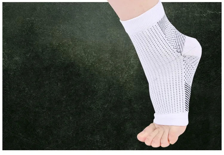 White compression ankle support sleeve worn on foot, orthopedic breathable design
