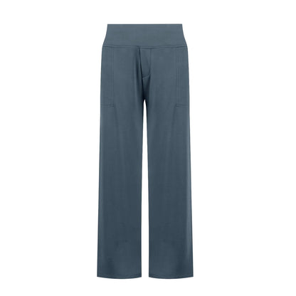 High-waisted blue wide-leg lounge pants with front pockets, modern minimalist design