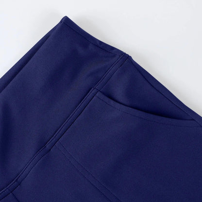 Close-up of navy blue fabric leggings with side pocket, modern activewear detail