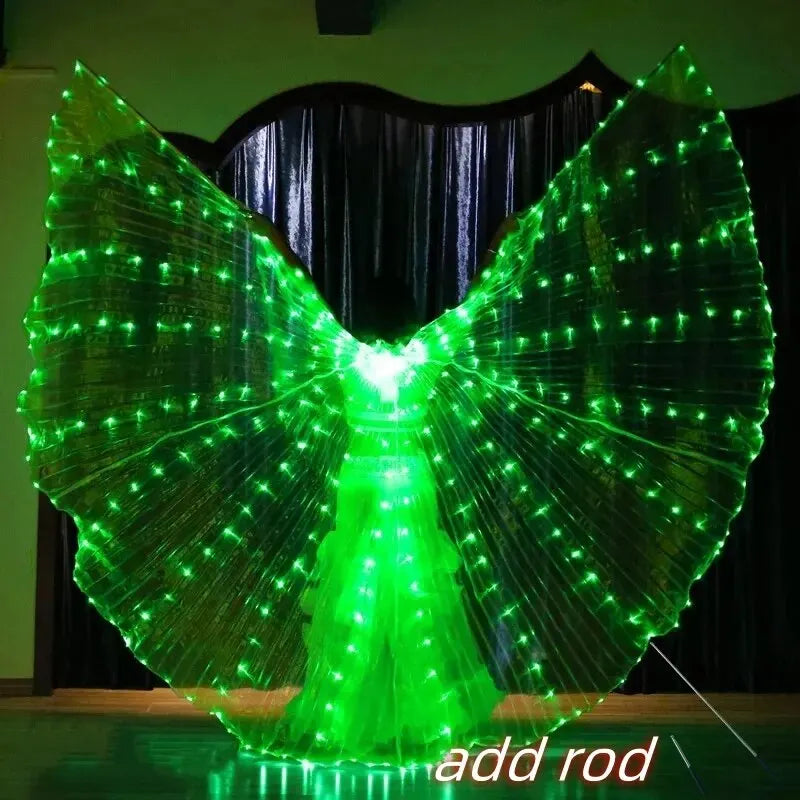 Person wearing large glowing green LED light up wings costume for dance or performance