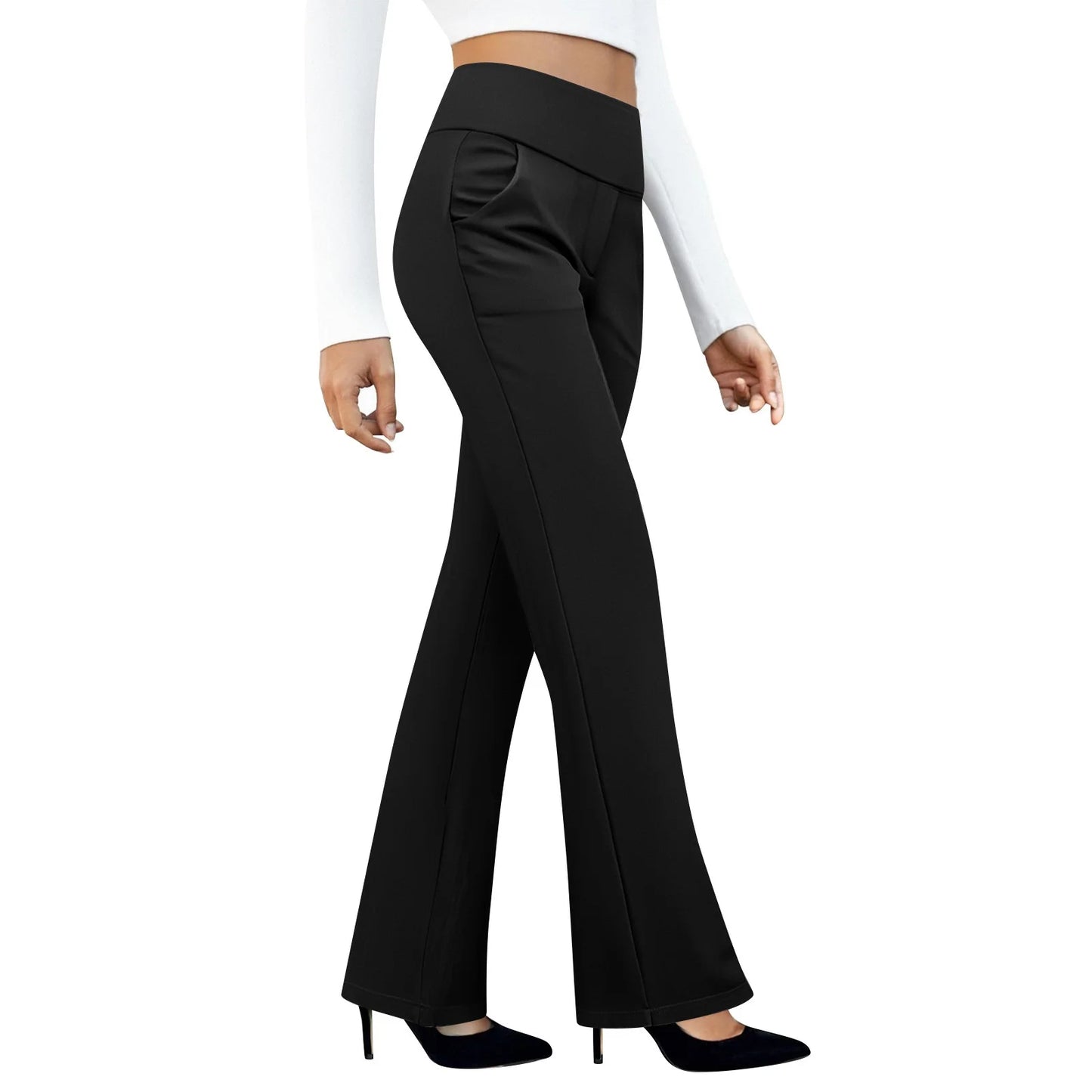 Woman wearing black high-waisted flare pants and black heels, white background
