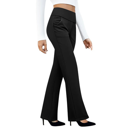 Woman wearing black high-waisted flare pants and black heels, white background