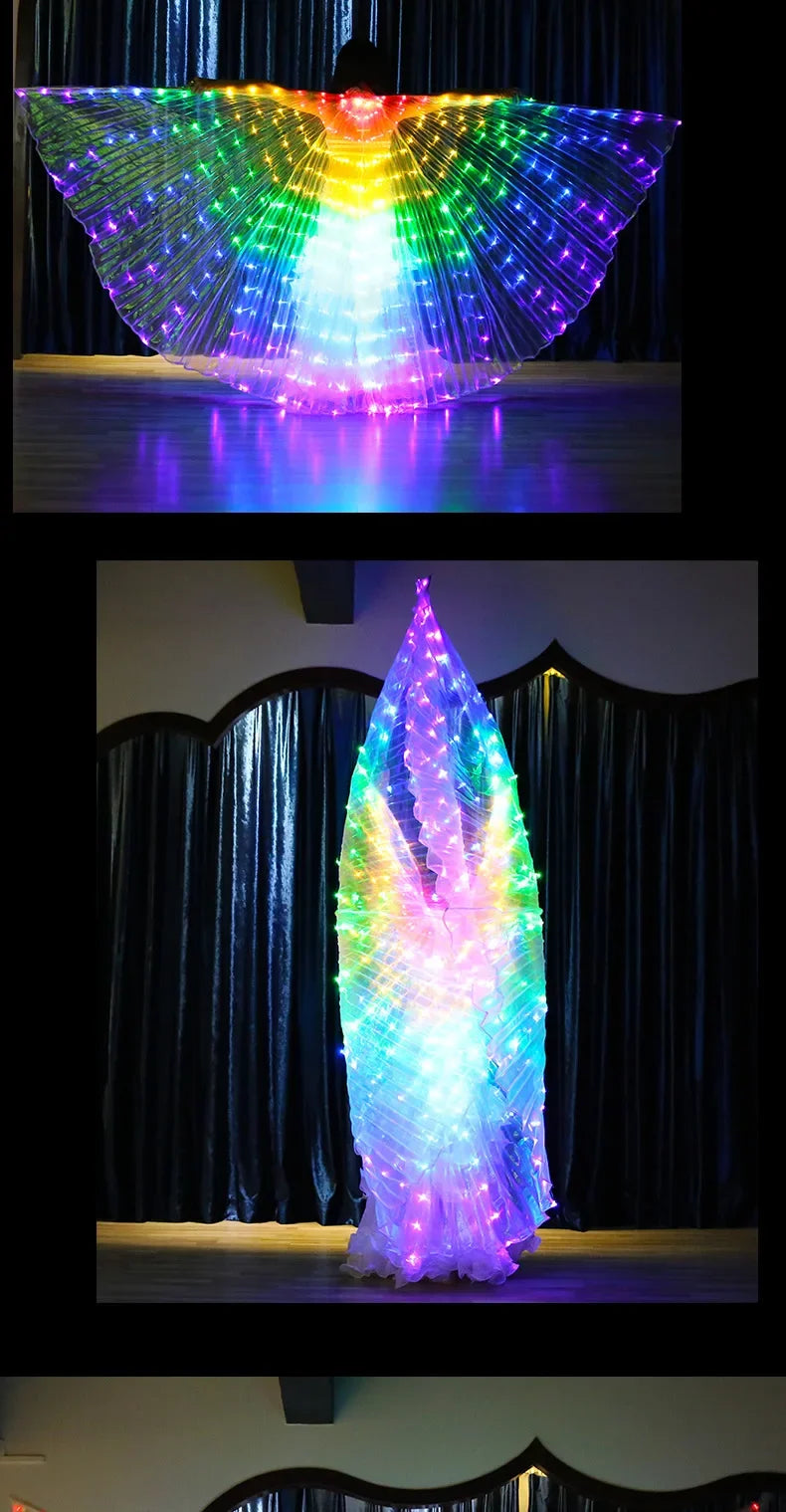 Person wearing LED light up butterfly wings costume with vibrant rainbow colors in a dark room