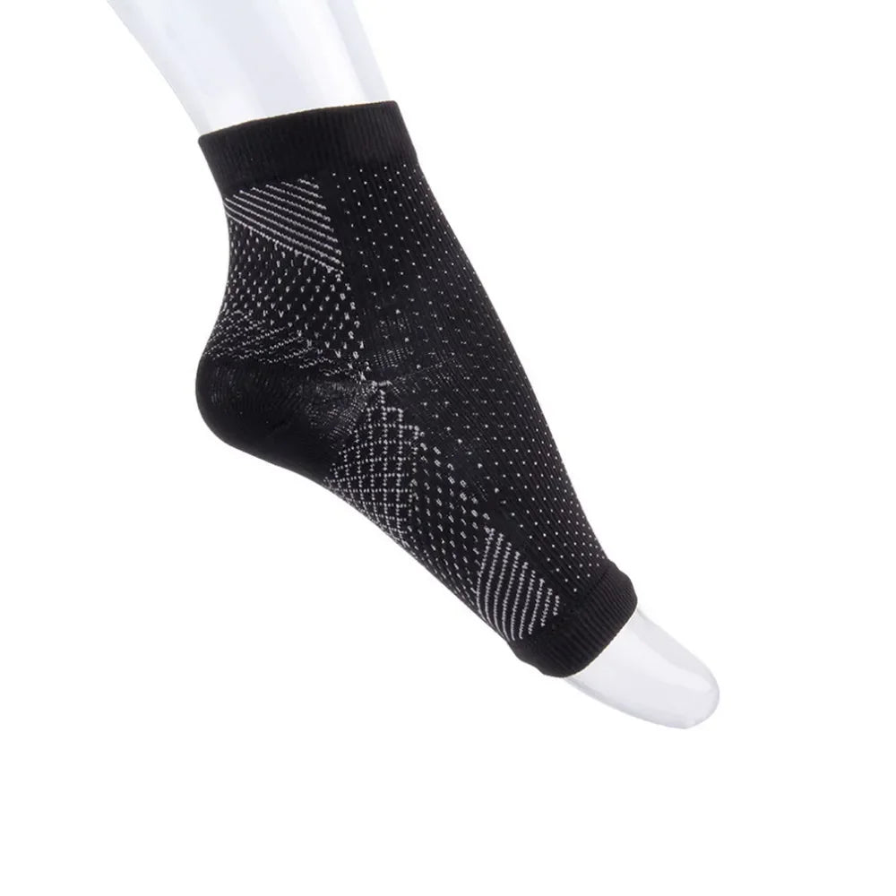 Black ankle compression sock with white geometric patterns on transparent foot model