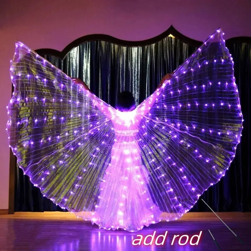 Person wearing purple LED light up wings costume with rods on indoor stage