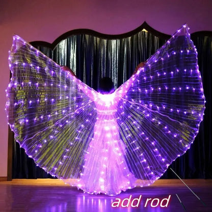 Person wearing purple LED light up wings costume with rods on indoor stage