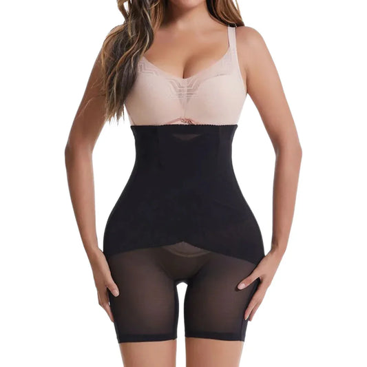 Woman wearing high-waisted black shapewear shorts for tummy and thigh control